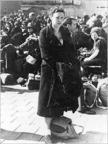 A Jewish woman waiting in the Polderweg railway station in Amsterdam prior to a deportation to the Westerbork camp.